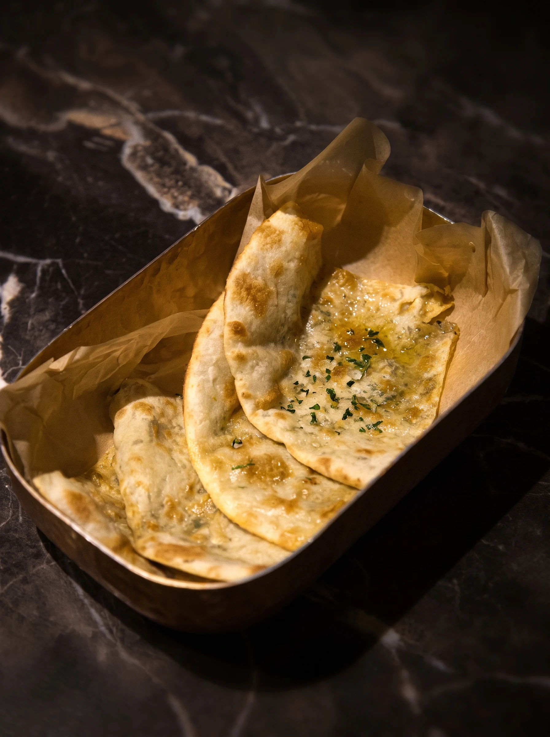 Naan, roti, paratha, kulcha: which bread goes with what